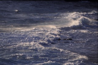 Waves breaking on the shore