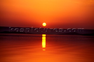 Sun setting over Croatian coastline