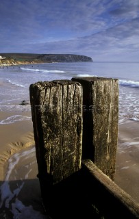 Wave Breakers on beach in Swanage, Dorset, UK