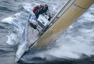 Scilly Island 10/08/2003. Rolex Fastnet Race 2003. Zephyrus V at the Fastnet Rock