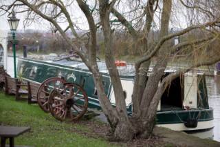 Canal boat moored outside public house (pub).  Canal boats on English Kennet and Avon Canals.