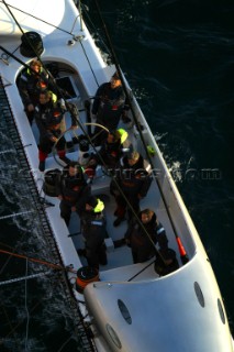 Maxi catamaran Orange skippered by Bruno Peyron crossing the startline of the Jules Verne