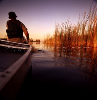 Artistic indian canoeing images from America