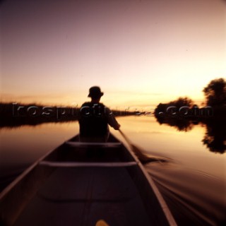 Artistic indian canoeing images from America