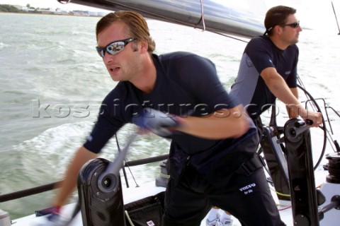 Crew wearing Henri Lloyd and Kaenon onboard the Farr 52 Team Tonic