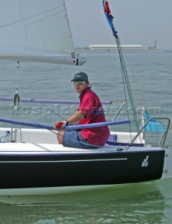 Skipper and crew onboard a J80