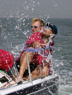 Skipper and crew onboard a J80