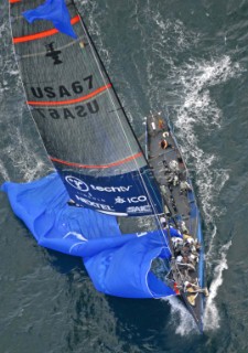 Auckland New Zealand - AmericaÕs Cup 2003 - Louis Vuitton Cup Semi Finals. 09-12-2002 One World broken the spinnaker on the last down wind leg.