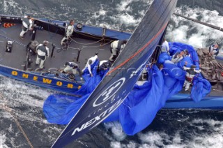 Auckland New Zealand - AmericaÕs Cup 2003 - Louis Vuitton Cup Semi Finals. 09-12-2002 One World broken the spinnaker on the last down wind leg.