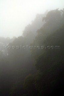 Yachts in the fog and mist on the River Dart in Devon