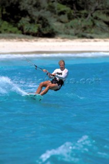 Kite surfers cruising in paradise