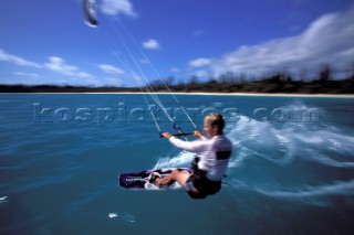 Kite surfers cruising in paradise