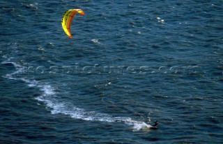 Kite surfers cruising in paradise