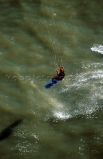 Kite surfers cruising in paradise