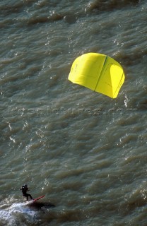 Kite surfers cruising in paradise