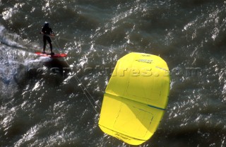 Kite surfers cruising in paradise