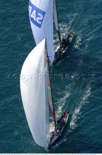 Switzerlands Alinghi Challenge leads Team New Zealands NZL-82 on the down wind leg to the bottom mark during race two of the Americas Cup in Auckland, New Zealand. Feb, 15. 2002.  Team New Zealand lead for most of race two to lose on the final down wind leg to Alinghi by 7 seconds. (Mandatory credit: © Sergio Dionisio/Oceanfashion Pictures)