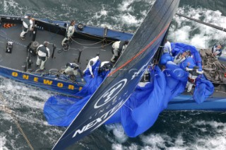 Auckland New Zealand - AmericaÕs Cup 2003 - Louis Vuitton Cup Semi Finals. 09-12-2002 One World broken the spinnaker iun the last dpown wind leg.