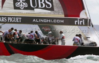 Switzerlands Alinghi Challenge skipper Russell Coutts centre guides SUI-64 around the top mark during race five to win the Americas Cup in Auckland, New Zealand. Mar, 02. 2003.  Alinghi lead from the start to win by 0.45 seconds to make history being the first team to ever with the Louis Vuitton challenge series and the Americas Cup.