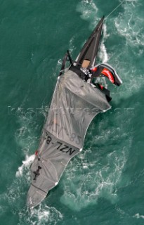 Team New Zealands NZL-82 stops dead in the water after breaking their mast during race four the Americas Cup in Auckland, New Zealand. Feb, 28. 2003. Team New Zealand suffered their second breakage of the event to trail Switzerlands Alinghi Challenge 4-0 in the best of nine races. (Mandatory credit: © Sergio Dionisio/Oceanfashion Pictures)