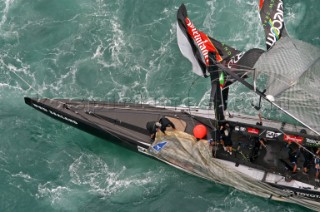 Crew members onboard Team New Zealands NZL-82 pull in the jib after breaking their mast during race four the Americas Cup in Auckland, New Zealand. Feb, 28. 2003. Team New Zealand suffered their second breakage of the event to trail Switzerlands Alinghi Challenge 4-0. (Mandatory credit: © Sergio Dionisio/Oceanfashion Pictures)