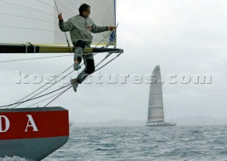 Italys Prada Challenge bowman Paolo Bassani sits on the spinnaker pole in perparation for testing after racing was called of on race day one of the Louis Vuitton Cup, Quarter final repechage.Auckland, New Zealand. Nov, 23. 2002  . (Photo credit: Sergio Dionisio/Kos Picture Source)