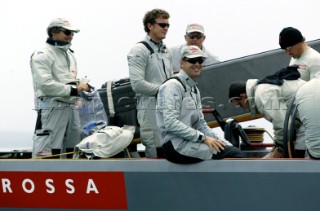 Italys Prada Challenge skipper Francesco de Angelis shears a smile with team mate onboard Luna Rossa during the Louis Vuitton Cup, Quarter final repechage in . Auckland, New Zealand. Nov, 23. 2002  . (Photo credit: Sergio Dionisio/Kos Picture Source)