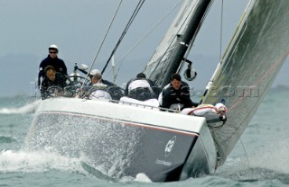 Team Dennis Conners Stars & Stripes head for the top mark. Louis Vuitton Cup, Quarter finals. Auckland, New Zealand. Nov, 16. 2002  (Photo credit: Sergio Dionisio/Kos Picture Source