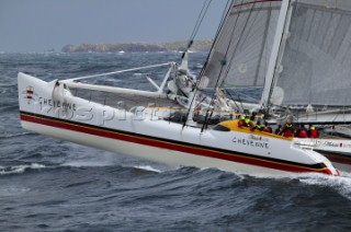 Maxi Cat Cheyenne owned by American Steve Fossett crosses the Finish after a record round the world non-stop voyage of 58 days, 9 hours, 32 minutes and 45 seconds.