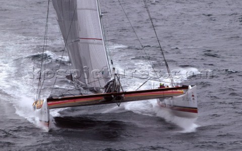 Maxi Cat Cheyenne owned by American Steve Fossett crosses the Finish after a record round the world 