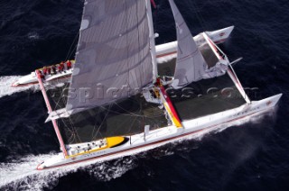 Maxi Cat Cheyenne owned by American Steve Fossett crosses the Finish after a record round the world non-stop voyage of 58 days, 9 hours, 32 minutes and 45 seconds.