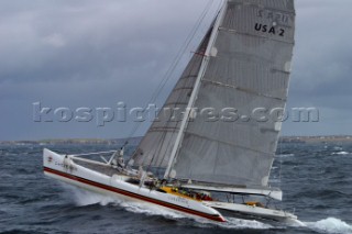 Maxi Cat Cheyenne owned by American Steve Fossett crosses the Finish after a record round the world non-stop voyage of 58 days, 9 hours, 32 minutes and 45 seconds.