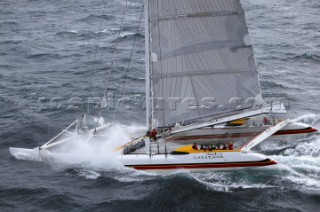 Maxi Cat Cheyenne owned by American Steve Fossett crosses the Finish after a record round the world non-stop voyage of 58 days, 9 hours, 32 minutes and 45 seconds.