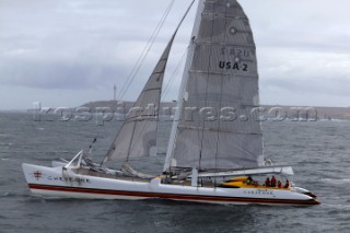 Maxi Cat Cheyenne owned by American Steve Fossett crosses the Finish after a record round the world non-stop voyage of 58 days, 9 hours, 32 minutes and 45 seconds.