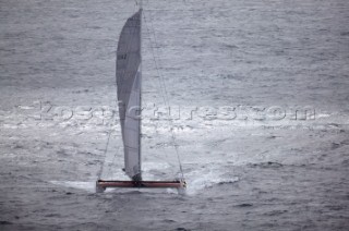 Maxi Cat Cheyenne owned by American Steve Fossett crosses the Finish after a record round the world non-stop voyage of 58 days, 9 hours, 32 minutes and 45 seconds.