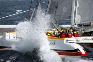 Maxi Cat Cheyenne owned by American Steve Fossett crosses the Finish after a record round the world non-stop voyage of 58 days, 9 hours, 32 minutes and 45 seconds.