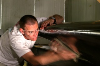 Paul Larsen (AUS) working on  SAILROCKET under construction in Southampton at NEG-MICON facility.