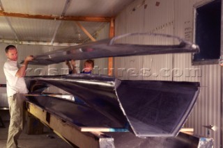 Paul Larsen (AUS) working on  SAILROCKET under construction in Southampton at NEG-MICON facility.