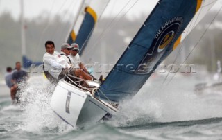 In wind of 20-25 knots Australias Peter Gilmour of Pizza-La Sailing Team leads New Zealands Chris Dickson of Team ORACLE BMW Racing during the finals to win the Investors Guaranty presentation of the King Edward VII Gold Cup 2003, Royal Bermuda Yacht Club, Hamilton, Bermuda. Oct, 26th. 2003   .