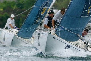 New Zealands Chris Dickson of Team ORACLE BMW Racing leads countryman Dean Barker of Team New ZealandÕs Omega Match Racing Team during the semi finals of the Investors Guaranty presentation of the King Edward VII Gold Cup 2003, Royal Bermuda Yacht Club, Hamilton, Bermuda. Oct, 25th. 2003   .