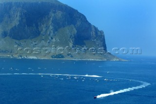 Powerboat P1 Team Thuraya (Pilot Ð Adriano Panatta) leading Team Rizzardi Racing (Pilot Ð Corrado Rizzardi) past some of the 400 spectator boats who turned up for the Grand Prix of Sicily