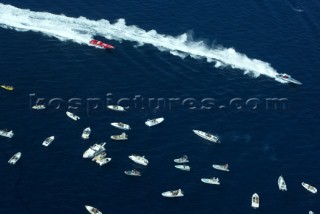 Just some of the 400 spectator boats enjoying the close action of the race leaders at the Grand Prix of Trieste, Team Rizzardi Racing (Pilot Ð Corrado Rizzardi) pulling out a lead on Team Thuraya (Pilot Ð Adriano Panatta)