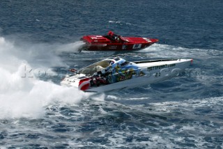 30/5/04, Valletta, Malta: Italian boat Cantieri del Mediterraneo, and Wettpunkt.com Both fly through the air as the negotiate the waves and wakes off Valletta Harbour