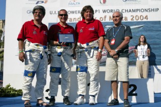 30/4/05 Valletta, Malta 2004. the president of Grimaldi ferrys presenting his prize to the top boat Thuraya