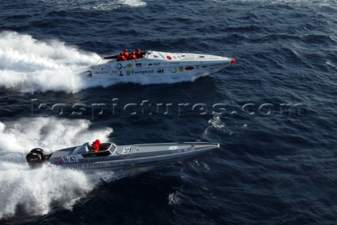 290504 Valletta Malta FainPlast motors past the British boat to take line honours