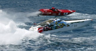 30/5/04, Valletta, Malta: Italian boat Cantieri del Mediterraneo, and Wettpunkt.com Both fly through the air as the negotiate the waves and wakes off Valletta Harbour