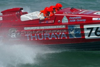 Overall winner of the Evolution Class THURAYA from Rome - Grand Prix of Italy -Powerboat P1 World Championship 2004. Claudio Castellani Ð Driver. Adriano Panatta Ð Throttleman. Luciano Salvatori Ð Navigator