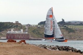 Round the Isle of Wight Race 2004 organised by the Island Sailing Club. Maxi cat Orange passing Hurst Castle attempting a new race record.