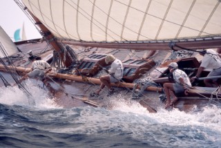 Wet crew on deck of classic  yacht Lady Anne.