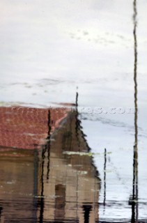 Colourful reflections in water of buildings and architecture in southern France